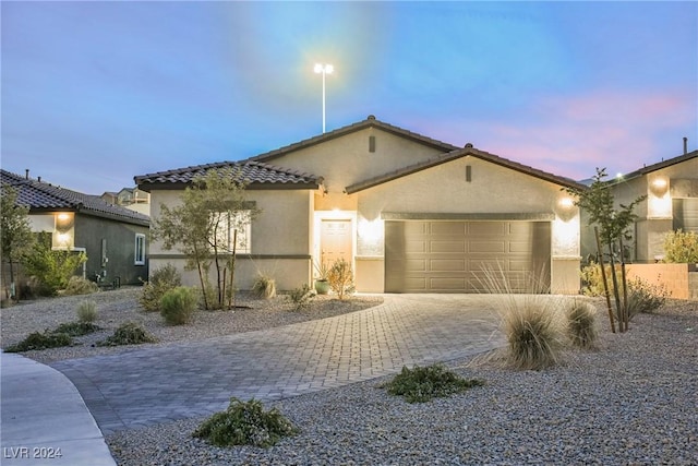 view of front of home featuring a garage