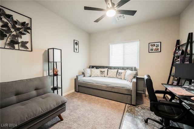 office area with ceiling fan and carpet floors