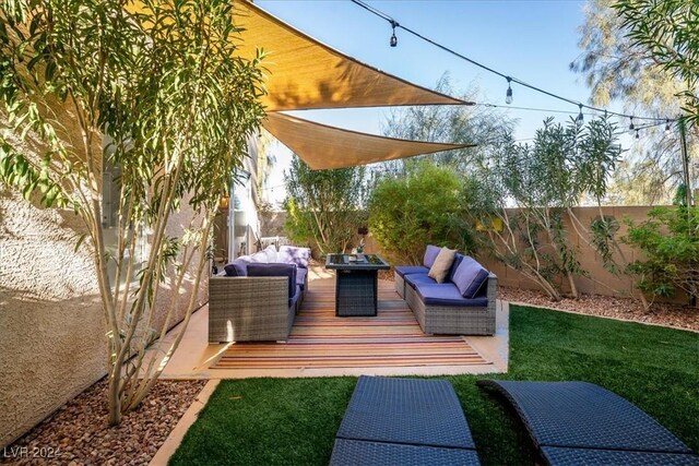 wooden deck with an outdoor hangout area