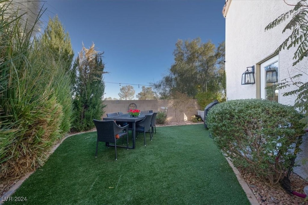 view of yard with a fenced backyard