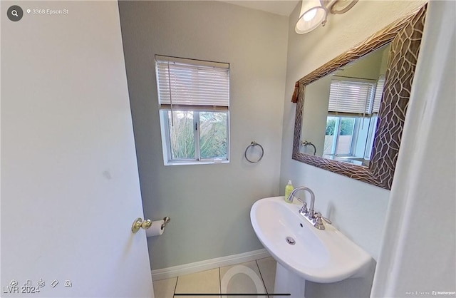 bathroom with sink and tile patterned floors