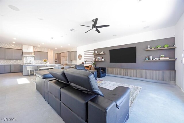 living room featuring ceiling fan