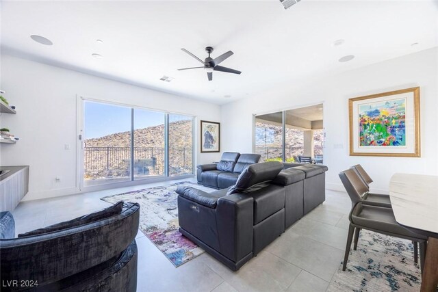 living room featuring ceiling fan