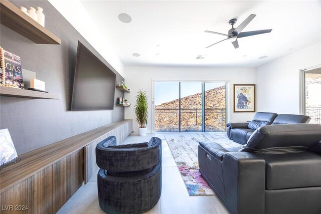 living room featuring ceiling fan