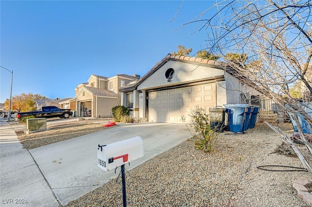 view of front of home featuring a garage