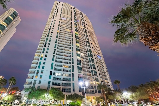 view of outdoor building at dusk