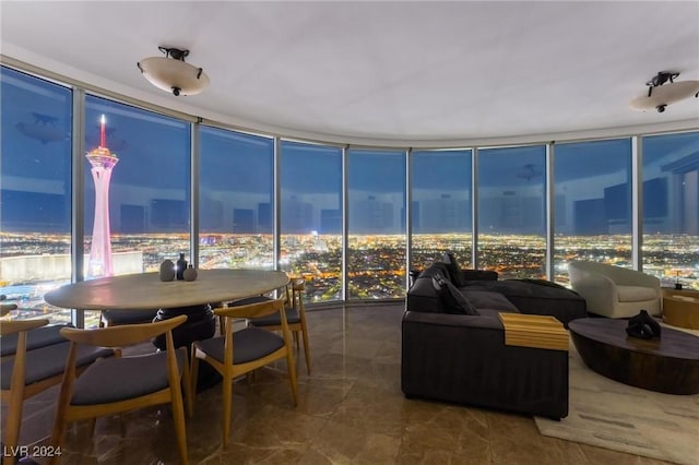 sunroom with a view of city lights