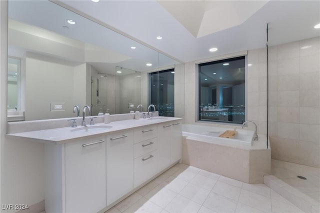 bathroom with separate shower and tub, tile patterned flooring, and vanity