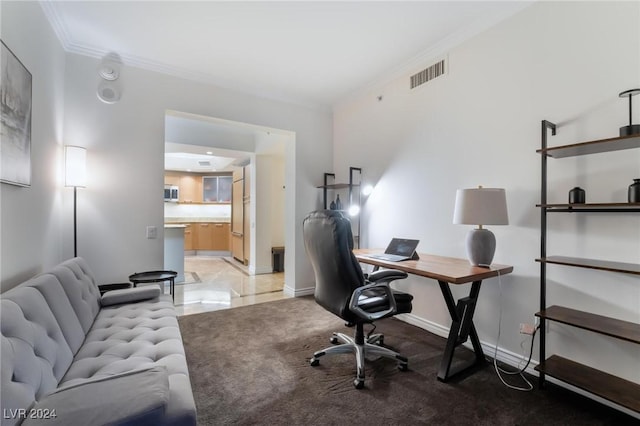 home office featuring visible vents, crown molding, and baseboards