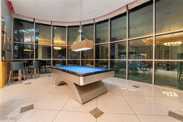 playroom featuring a wall of windows, tile patterned flooring, and pool table