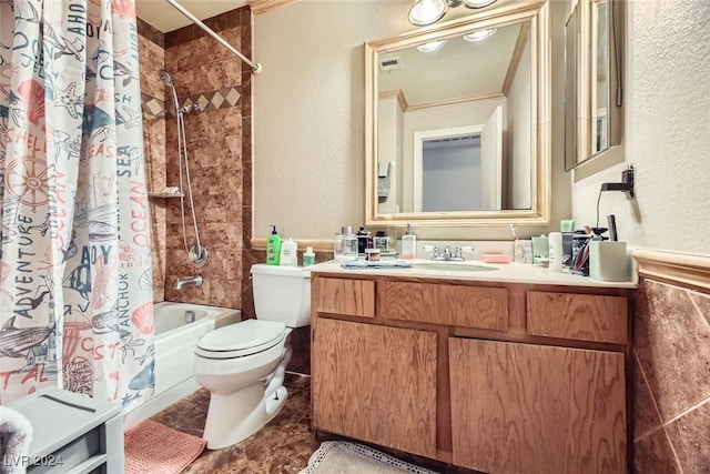 full bathroom featuring vanity, toilet, ornamental molding, and shower / tub combo