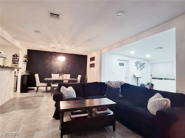 living room featuring light tile patterned floors