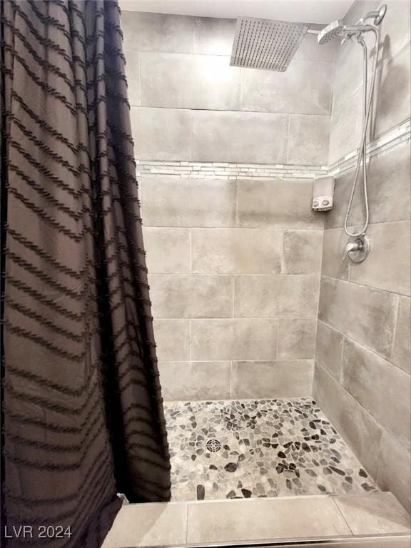 bathroom featuring walk in shower