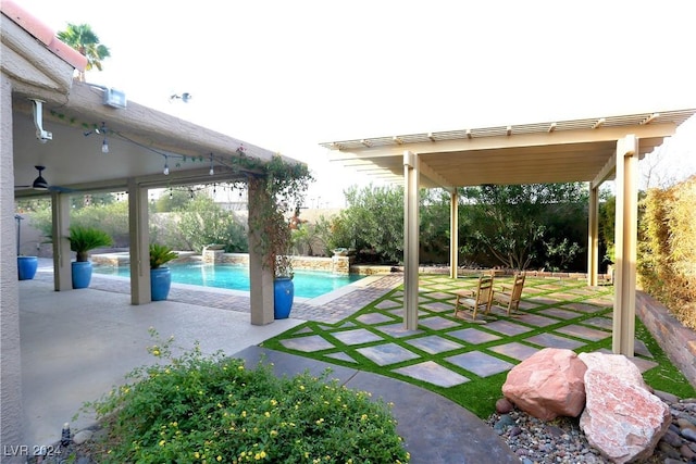 exterior space featuring pool water feature and a patio