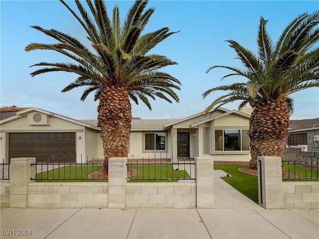 view of front of property with a garage