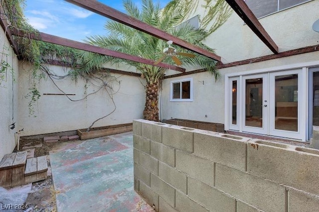 view of patio featuring french doors