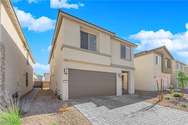 front of property featuring a garage