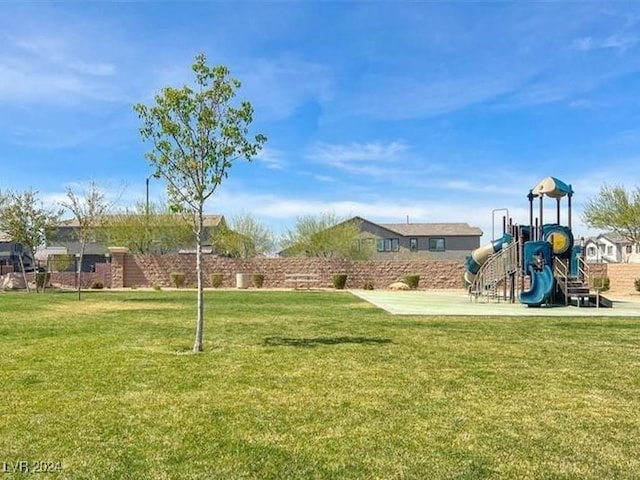 view of playground with a yard