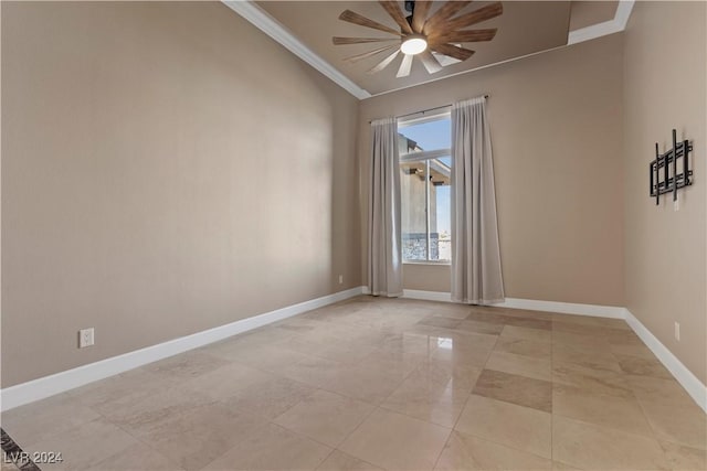 unfurnished room with ceiling fan and ornamental molding