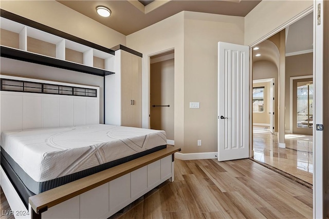 bedroom with light wood-type flooring