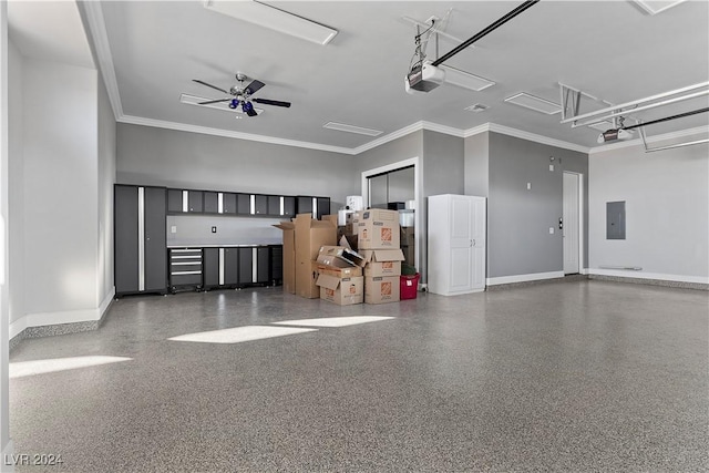 garage featuring electric panel, a garage door opener, and ceiling fan