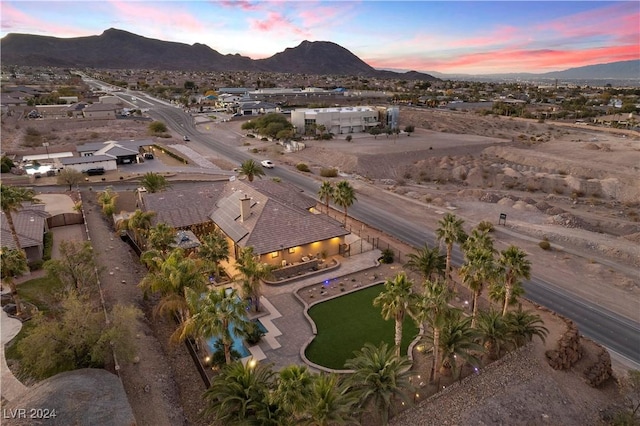 aerial view at dusk with a mountain view