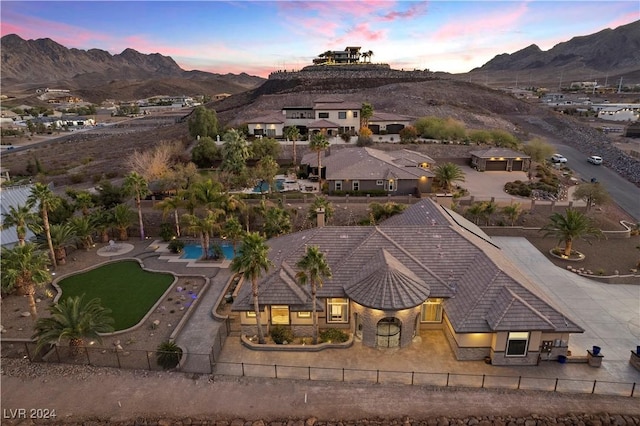 aerial view at dusk with a mountain view