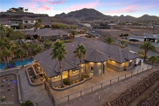 aerial view at dusk with a mountain view