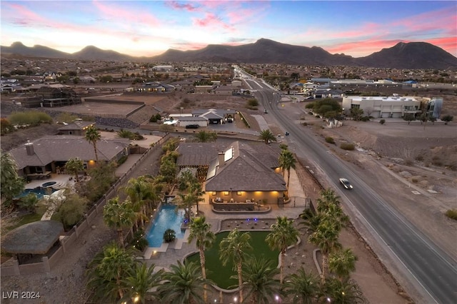 aerial view at dusk with a mountain view