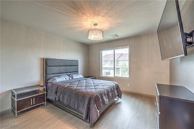 bedroom featuring light wood-type flooring