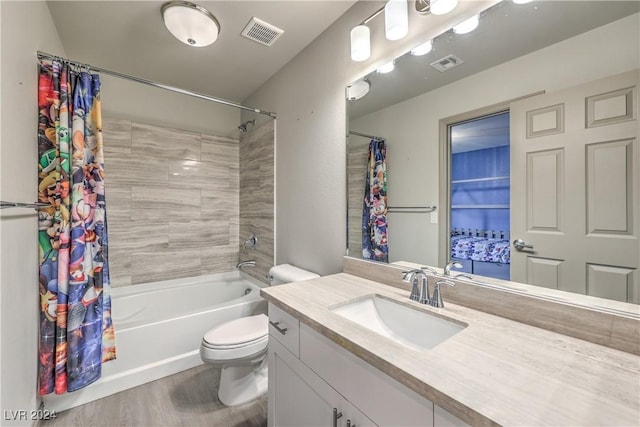 full bathroom featuring vanity, toilet, shower / bathtub combination with curtain, and wood-type flooring