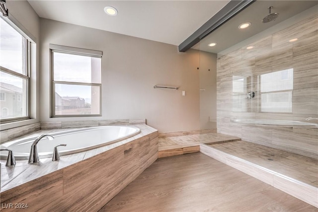 bathroom with tiled shower