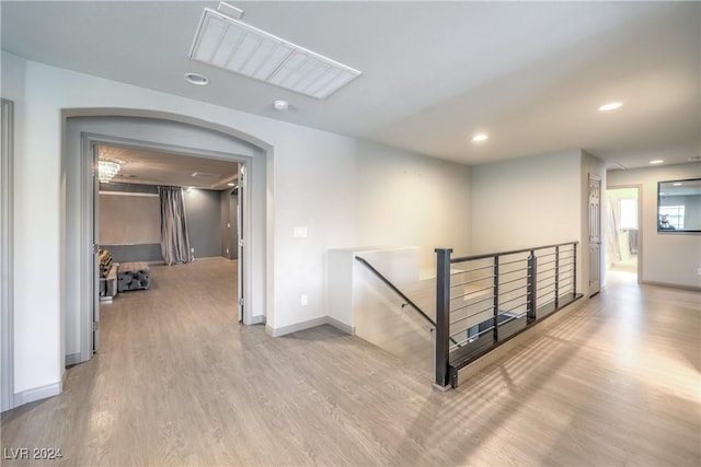 hallway with light wood-type flooring