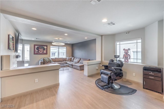 living room featuring light wood-type flooring