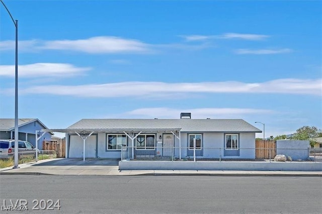 single story home featuring a garage