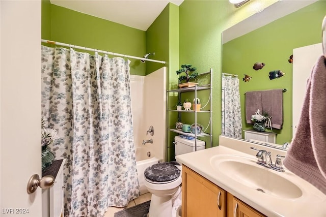 full bathroom featuring tile patterned flooring, shower / bath combo, toilet, and vanity