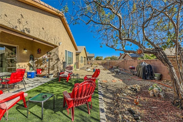 view of yard with a patio area