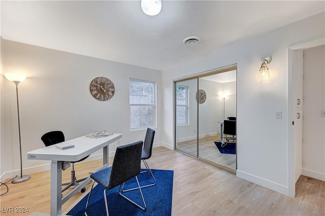 office area with hardwood / wood-style flooring