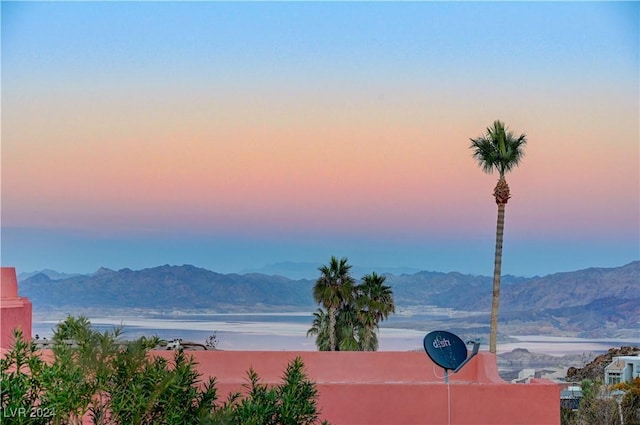 view of mountain feature with a water view