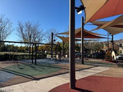 view of home's community with a playground