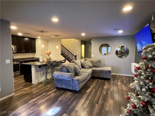 living room featuring dark hardwood / wood-style flooring