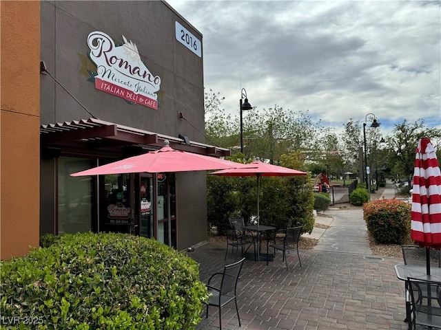 surrounding community with a patio area