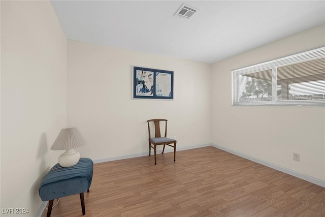 sitting room featuring light wood-type flooring