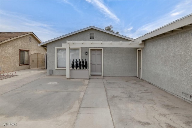 view of front of house with a patio