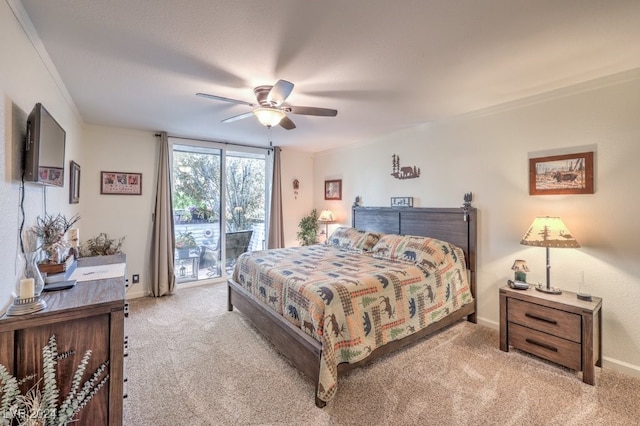 bedroom featuring access to exterior, light carpet, ceiling fan, and ornamental molding