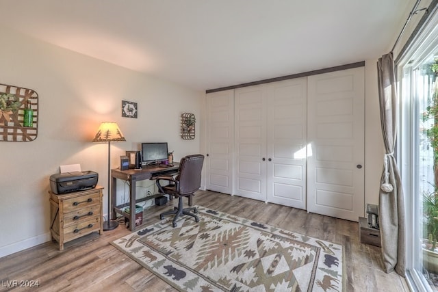 office area with hardwood / wood-style floors