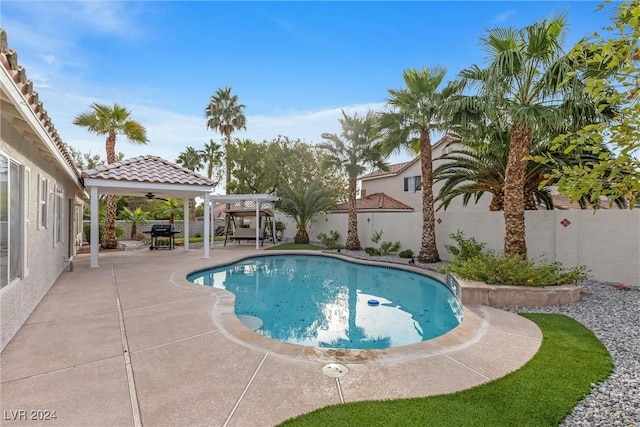 view of pool with a patio area and a pergola