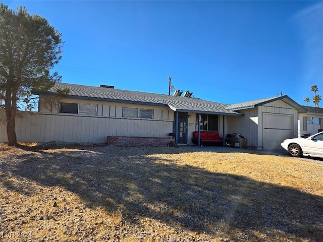 ranch-style home with a garage