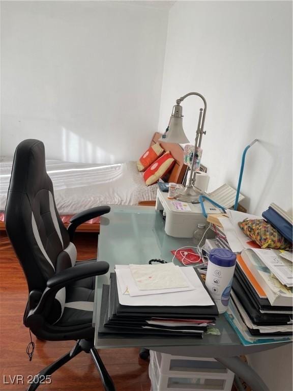 office with wood-type flooring