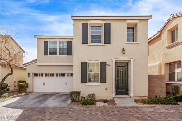 view of front of property featuring a garage